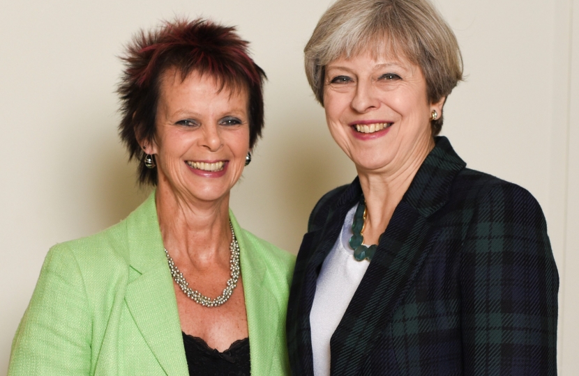 Anne Milton and Theresa May